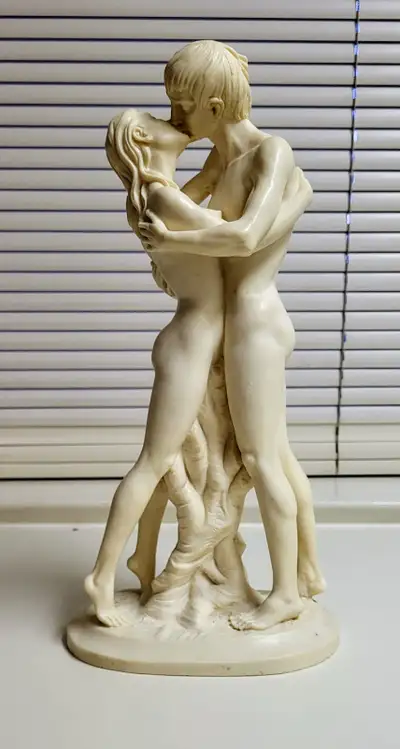 Measures 15" high. Base measures 7 1/2". Santini statue of man and woman made of alabaster. Signed A...