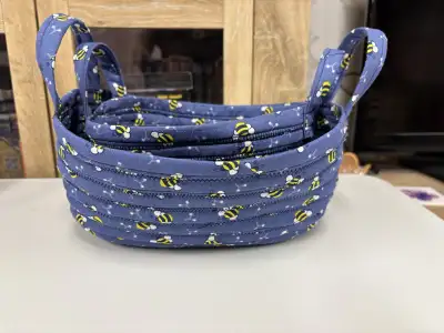 This Jelly Roll Basket set is perfect for around the house. The blue goes with so many decor options...