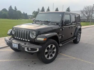 This pre-owned 2023 Jeep Wrangler Sahara is a rugged and reliable SUV, perfect for both daily commut...