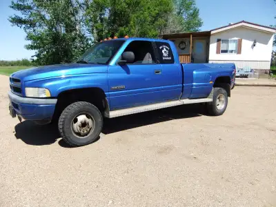Estate selling a blue extended cab 3500 Ram mega, five speed, 4x4, Cummins motor with only 427763kms...