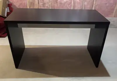 Used desk in espresso color sold as is. Dimensions: 55wx29.5dx30h Has signs of wear from moving. See...