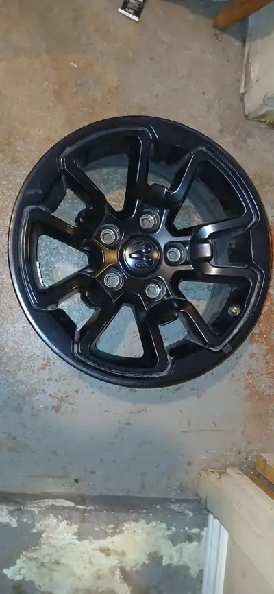 A set of 4 Ram Rebel 17 inch 5 bolt,black rims. They were removed from the truck when it had 50 kms...