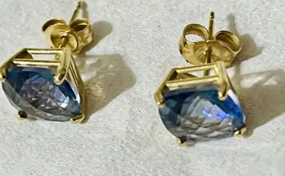 Beautiful earrings with blue aquamarine stones 14k stamped on post and backing in perfect condition...