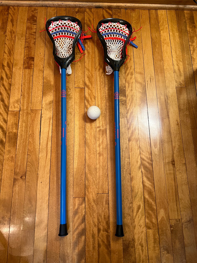 Deux bâtons de crosse de marque Warrior EVO Next 40 pouces dans Crosse  à Ville de Montréal