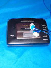 Aiwa TA161 am/fm Cassette player with Panasonic earphones
