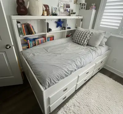 Solid wood trundle bed with built-in bookshelf, View more