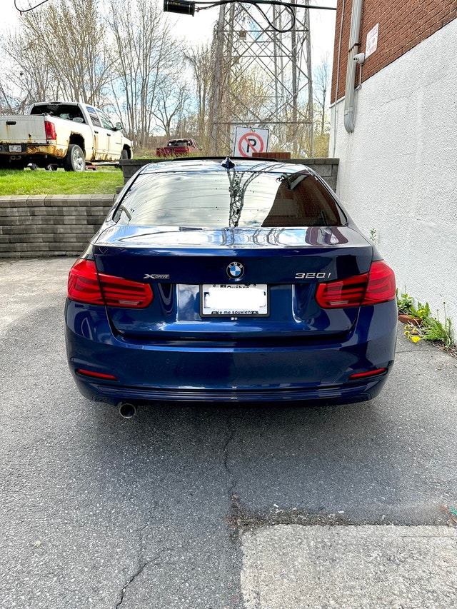 BMW 320i Xdrive — photo 3