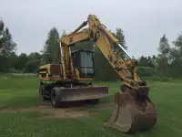 Excavatrice sur roues Caterpillar