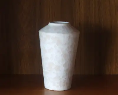This Scheurich West German Vase from the early 1980s has a marbled glaze in light pink and white. It...