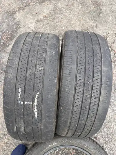 2 Bridgestone 225/50/R18 run-flat tires with around 4mm or more tread left. They have no patches.
