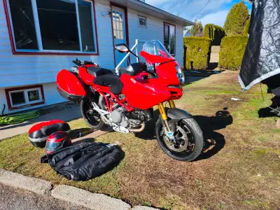 2007 Ducati Multistrada 1100S comes with full touring luggage and riding gear and helmets
