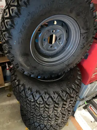 4 Brand new Kubota RTV X series rim and tires. 4 bolt pattern rims with 25x10.00-12. 350Mag Off Road...