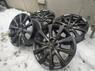 OEM Mazda 16 inch rims with tire pressure sensors. Like new used one season for winter tires on a 20...