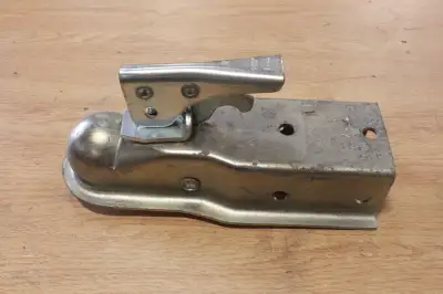 1 7/8" x 2" class 1 trailer coupler. Fits 1 7/8" ball. New, never installed. (some tarnishing on the...
