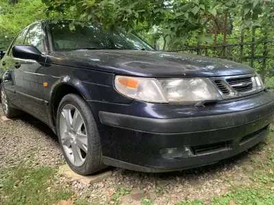 1999 Saab 9-5 parts or whole car. Car does not run ; no exhaust, rims not included, colour Midnight...