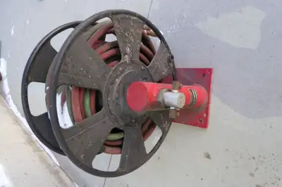 Good used cutting torch reel comes with hose, came off welding truck