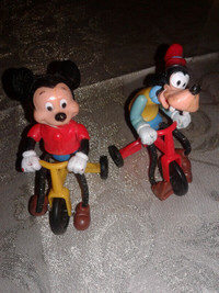MICKEY MOUSE AND GOOFY ON BICYCLES