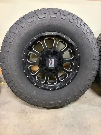 285/75 R18 M + S Copper AT3 XLT mounted on 18” XD Series 8 bolt rims Roughly 35” tall tires, lots of...