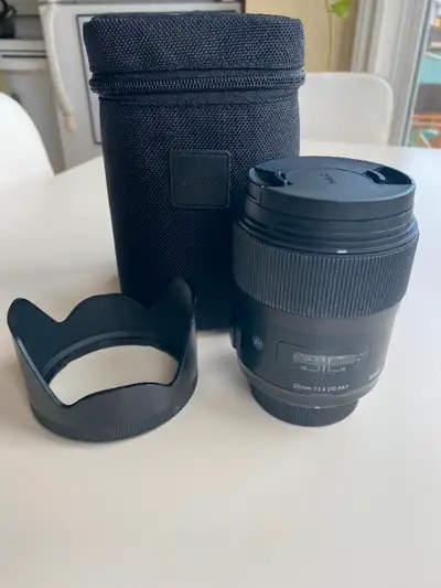 Good condition Sigma Art lens. I love this lens so much!! I'm just switching over to mirrorless. Min...