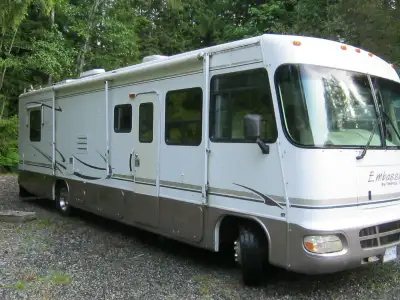 2001 new tires,charging system,glass all good,hydrolic slide,jacks,full bath,two TVs,suround sound,m...