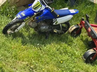 2006 Yamaha TTR 50E with new battery, new rear tire and tube, new pro taper grips new oil and air fi...