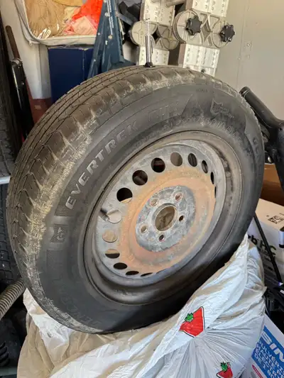 General Evertrek RTX all season tire 195/65 R15 Five hole 114 Come off Honda Civic. Tire tread aroun...
