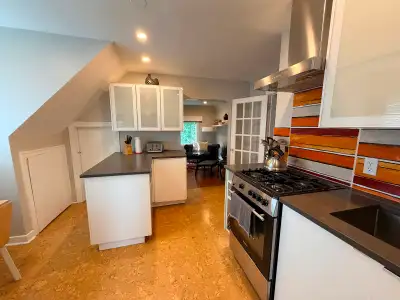 Bright, top floor suite of a house in quiet, family friendly neighbourhood. Fully furnished. Free st...