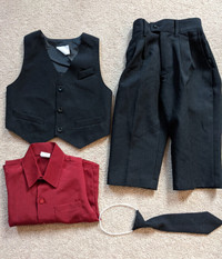Toddlers dress clothes including pants, tie, vest, and red shirt