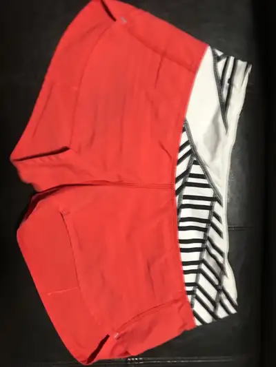 Lululemon coral colour shorts size 4, View more