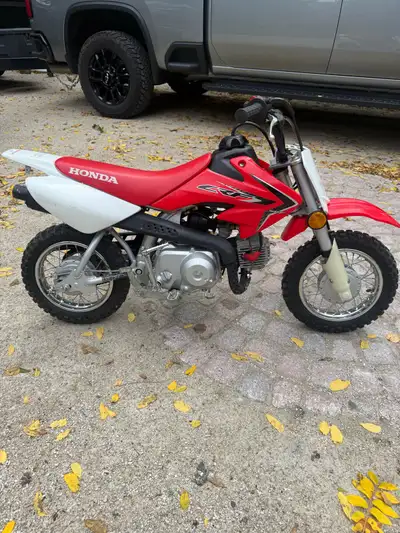 Like new 2013 Honda CRF50. Completely stock. Always stored inside. It has a couple scuffs but overal...