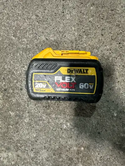 This is a used DeWalt FlexVolt 20V/60V MAX 9.0Ah Lithium Ion battery, perfect for your DeWalt power...