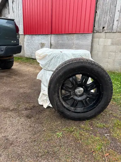 Mounted Yokohama 275/55R20 117T ice guard tires (excellent condition). Mounted on black 8 spoke whee...