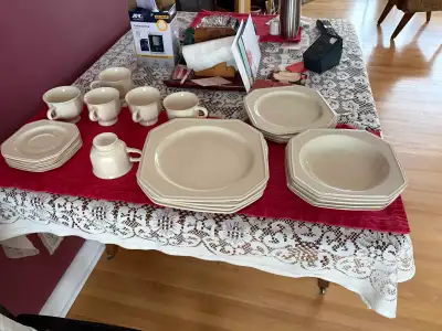 I'm offering a beautiful set of Mikasa "Cherry Blossoms" dinnerware, perfect for adding a touch of e...