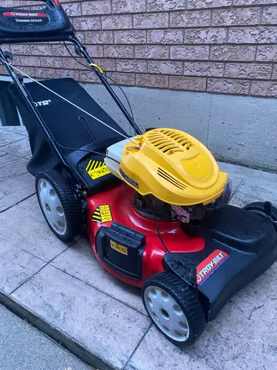 Troy-Bilt self-propelled gas 21” lawn mower designed for residential or commercial use. Powerful Tec...