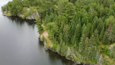 Some of the last untouched, undeveloped large acreage on Lake Of The Woods! With over 3500' of shore...