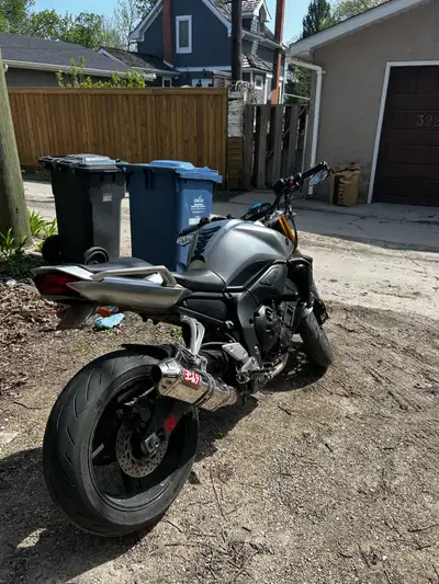 Selling my 2006 Yamaha FZ1 Reason of selling. No time to ride it Mods: Tidy Tail Frame Slider Yoshim...