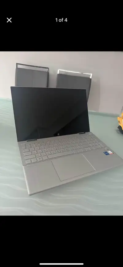 2 years use, very light use (about 5-7 days per year) Selling my HP Pavilion x360 convertible laptop...