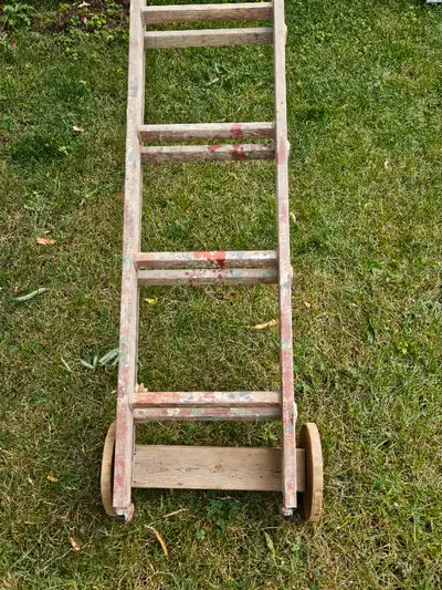 All ladders are well used but in good condition. 24' , 12 rung extension ladder, with cool little wo...