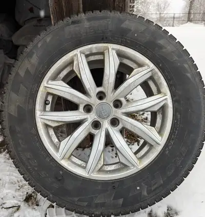 Selling a full set of 4 Pirelli Ice Zero R winter tires (235/65 R17) mounted on OEM Audi wheels. $55...