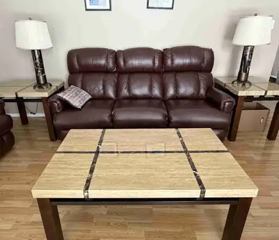 Beautiful solid wood 3-piece coffee table/end tables from Ashley Furniture. Also available 1) Two la...