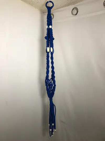 Vintage Blue Macrame with White Beads. Good condition 37” overall length Can hold a pot up to 6” $15...