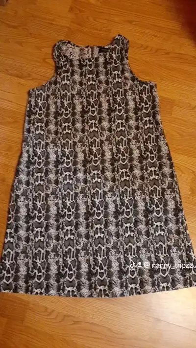 $10 NEW Karen Kane dress. Black and white leopard print. Sleeveless with exposed back zipper. Pocket...