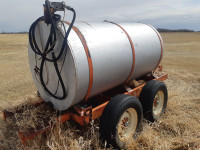 Tandem trailer and fuel tank and transfer pump