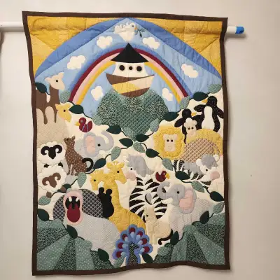 Noah's Ark-themed baby quilt, featuring the ark and rainbow, View more