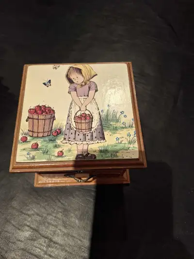 Beautiful vintage musical jewelry box. Top drawer is only for show. Made out of wood. In good used c...