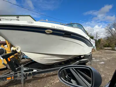 2002 four winns 24 ft cuddy cabin, new seats, new drive with warranty,new tonneau cover 5.7 Volvo Pe...
