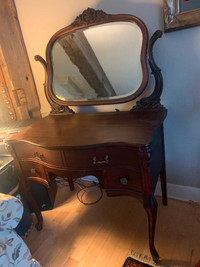 Antique mahogany vanity with beveled mirror