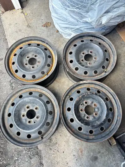 These are a set of four steel rims with a 5x4.5" or 5x114.3mm bolt pattern and a 16x6 1/2 inch size....