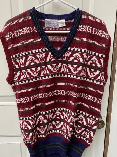 Mens pullover sweater vest size medium 100% acrylic. Multi coloured pattern. Can be picked up week d...