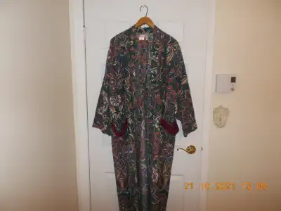 Bathrobe and matching slippers like new., View more